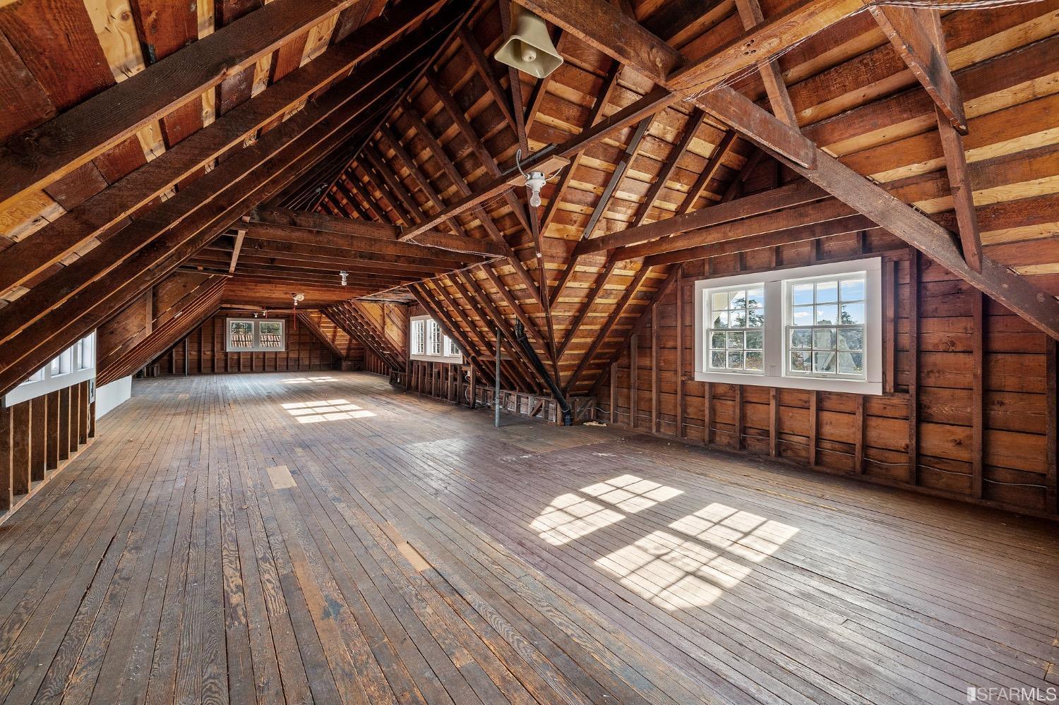 2967 Avalon Avenue Berkeley, CA 94705 - Photo 57 of 77 a view of an empty room with wooden floor and windows