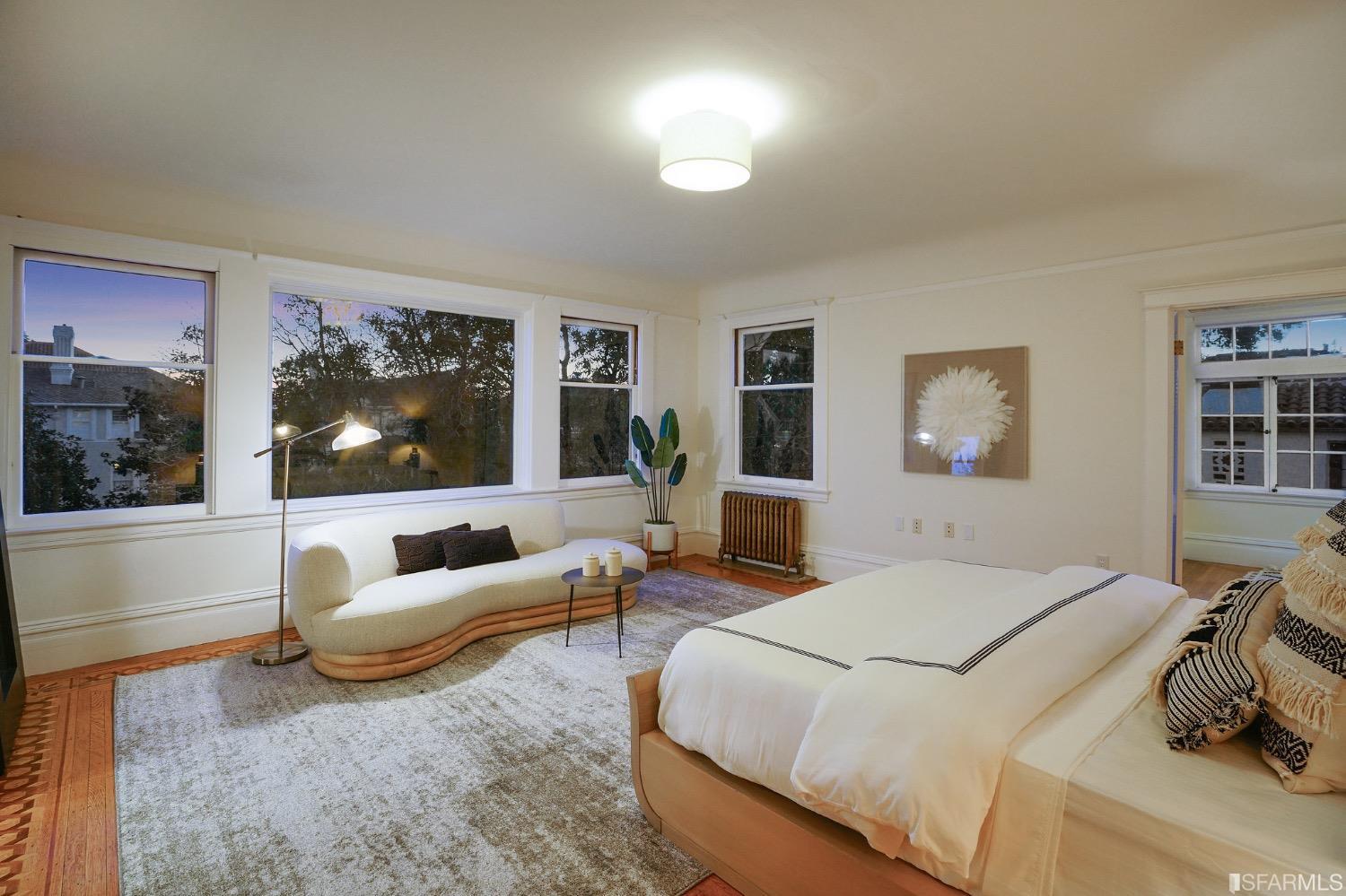 2967 Avalon Avenue Berkeley, CA 94705 - Photo 72 of 77 a bedroom with a bed and glass window