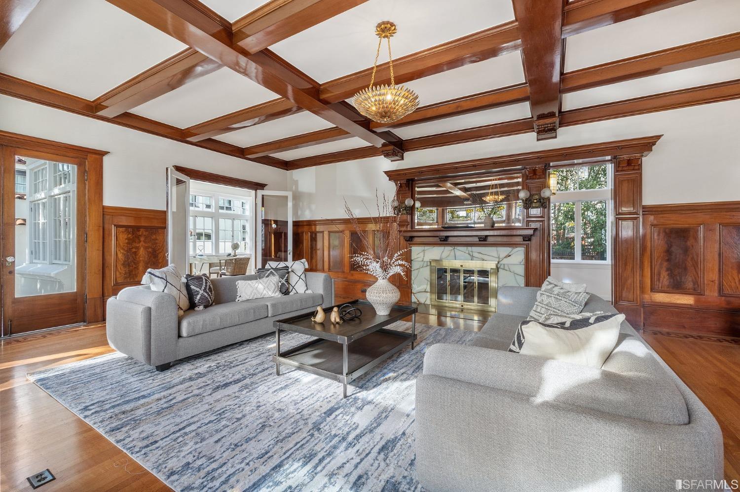 2967 Avalon Avenue Berkeley, CA 94705 - Photo 8 of 77 a living room with furniture wooden floor and a fireplace