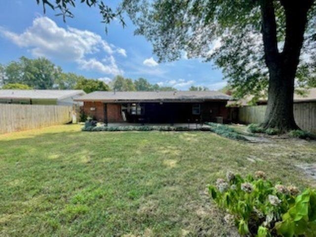 3347 South Perkins Road Memphis, TN 38118 - Photo 18 of 19 a view of a house with a yard balcony and sitting area