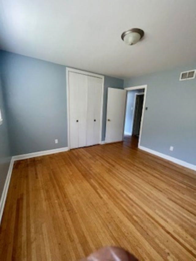 3347 South Perkins Road Memphis, TN 38118 - Photo 5 of 19 a view of room with wooden floor