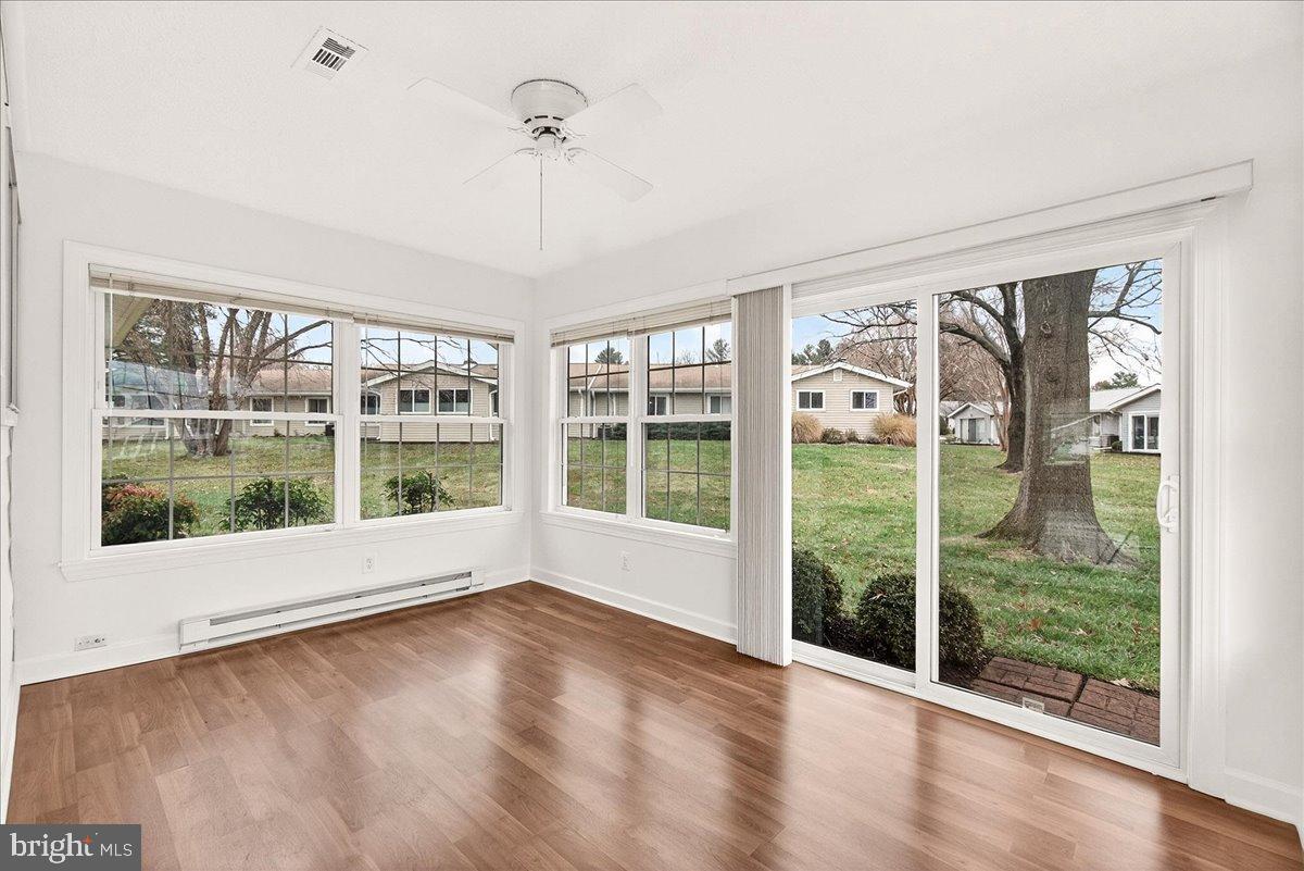 9 Fitzhugh Court, Unit 71B Silver Spring, MD 20906 - Photo 15 of 48 Sliding glass door leads to backyard