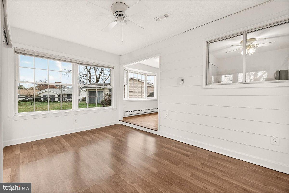 9 Fitzhugh Court, Unit 71B Silver Spring, MD 20906 - Photo 16 of 48 More windows in the sunroom