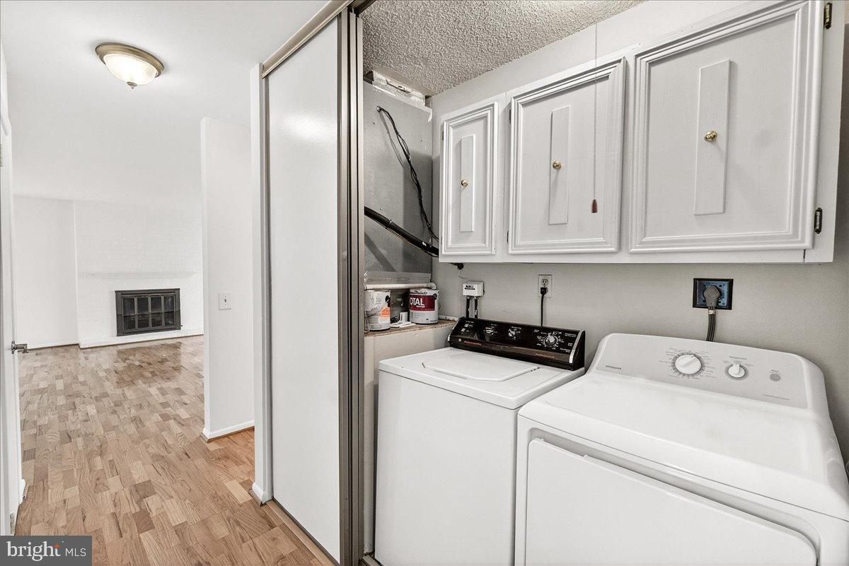 9 Fitzhugh Court, Unit 71B Silver Spring, MD 20906 - Photo 26 of 48 Laundry in hallway