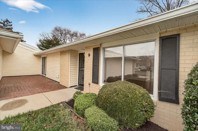 a view of a backyard of the house