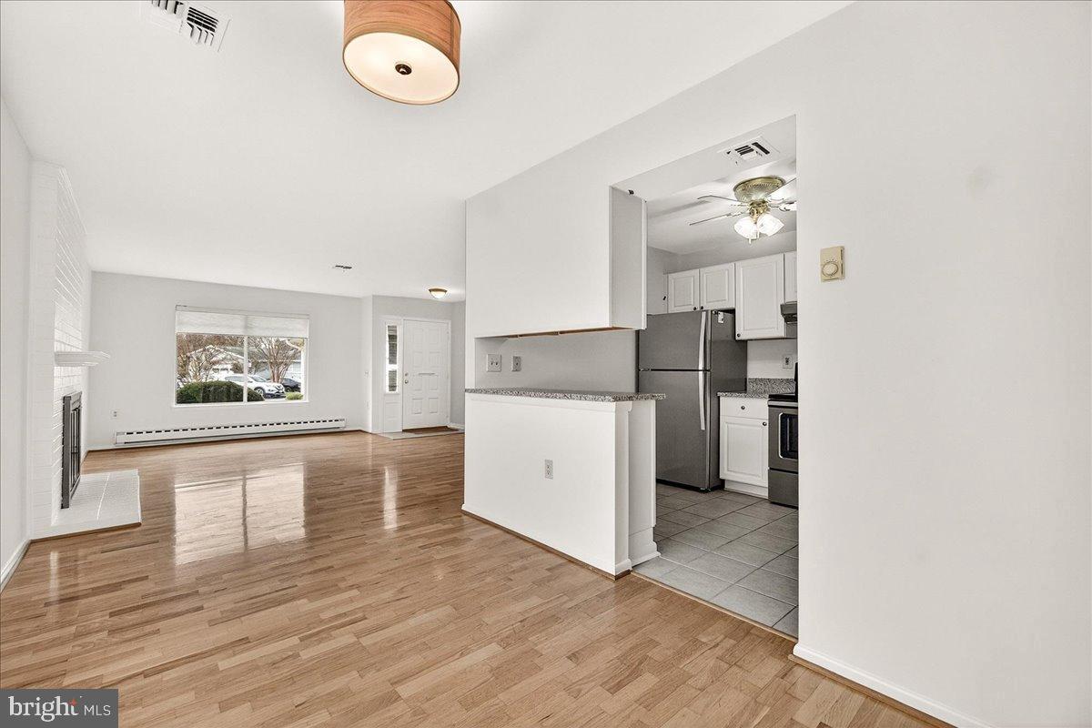 9 Fitzhugh Court, Unit 71B Silver Spring, MD 20906 - Photo 9 of 48 Open concept living and dining rooms