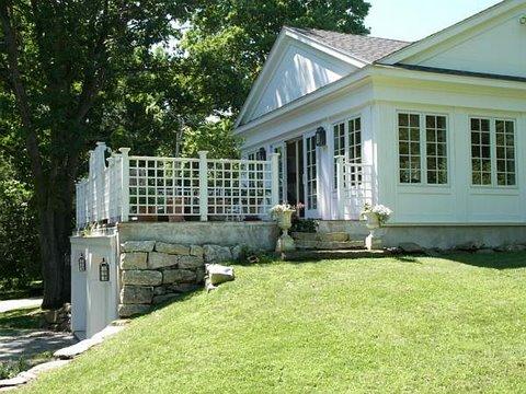 46 Interlaken Road Stockbridge, MA 01262 - Photo 18 of 35 a front view of a house with a yard