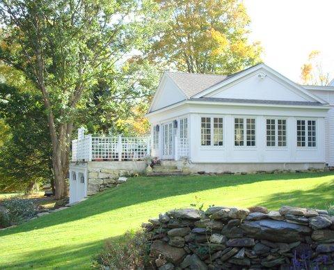 46 Interlaken Road Stockbridge, MA 01262 - Photo 19 of 35 a view of a house with swimming pool and a yard