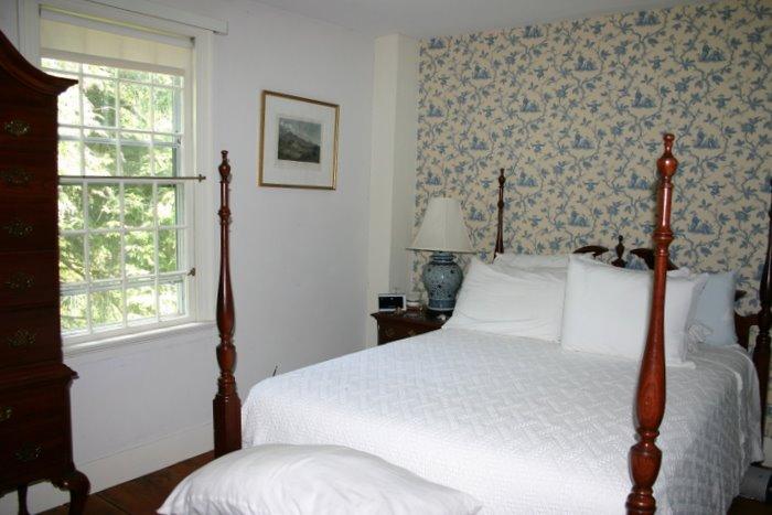 46 Interlaken Road Stockbridge, MA 01262 - Photo 32 of 35 a bedroom with a bed and a window