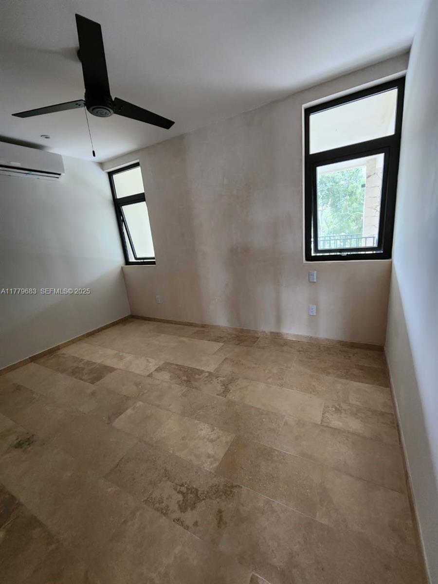 77760 Itzamna, Unit D101 undefined, FL 00000 - Photo 25 of 35 an empty room with a window