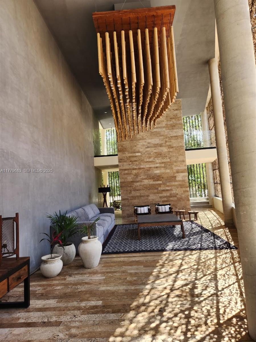 77760 Itzamna, Unit D101 undefined, FL 00000 - Photo 34 of 35 a living room with furniture