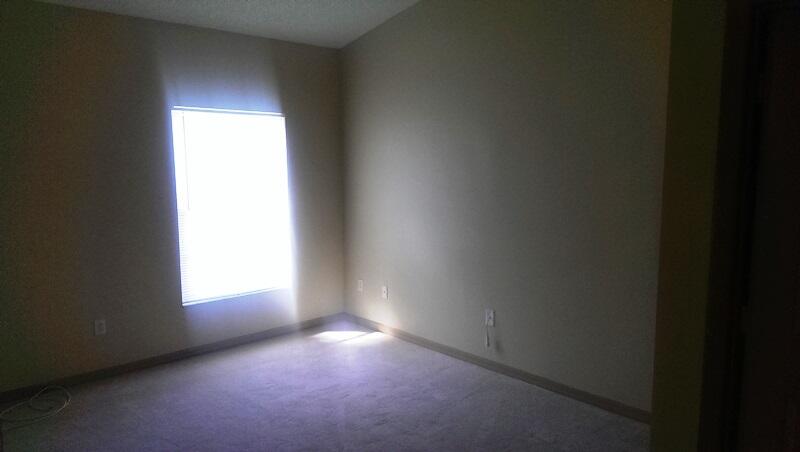 10276 Fox Trail Road South, Unit 111 West Palm Beach, FL 33411 - Photo 12 of 16 a view of an empty room and a window