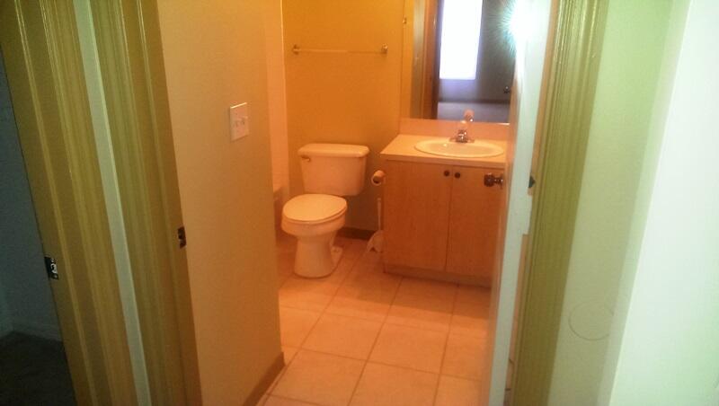 10276 Fox Trail Road South, Unit 111 West Palm Beach, FL 33411 - Photo 13 of 16 a bathroom with a sink and a toilet