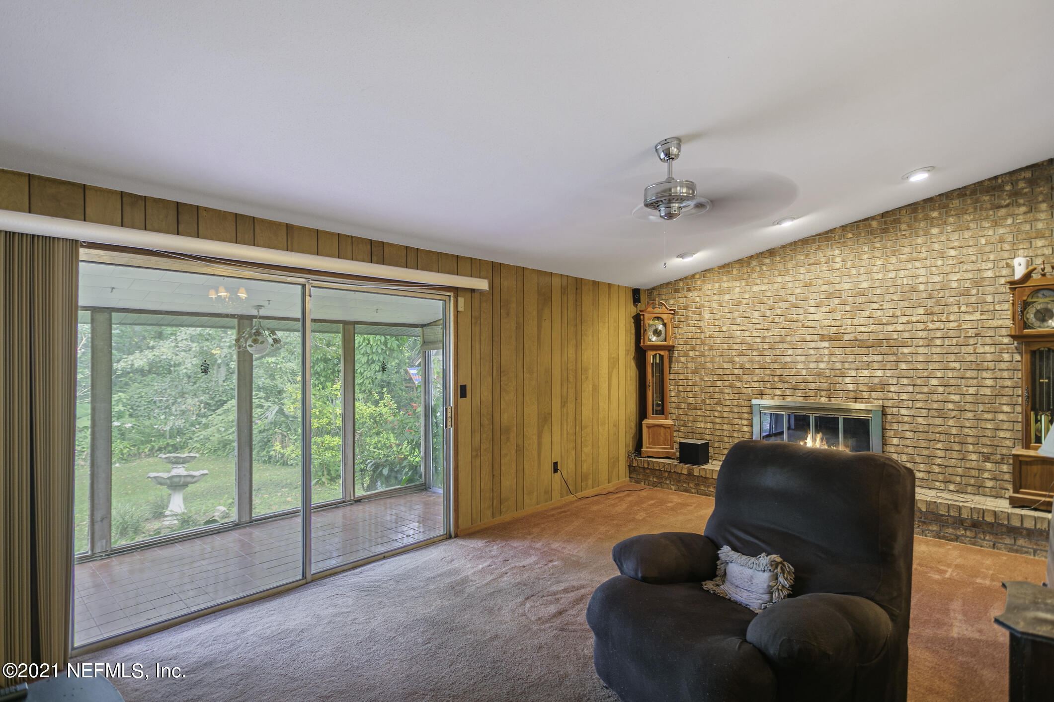 3719 Lilly Road North Jacksonville, FL 32207 - Photo 19 of 61 a living room with furniture and a large window