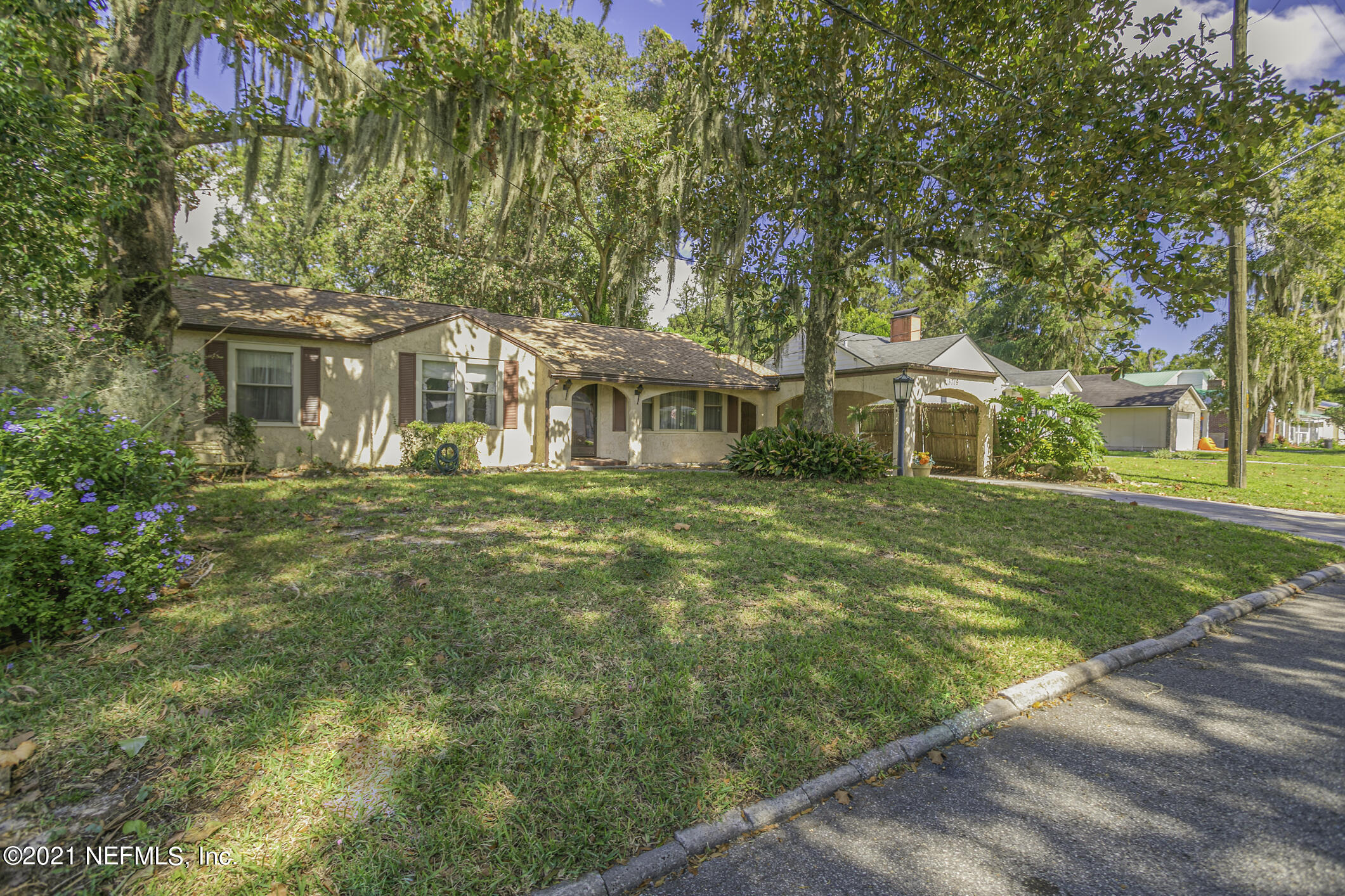 3719 Lilly Road North Jacksonville, FL 32207 - Photo 3 of 61 a front view of a house with a yard
