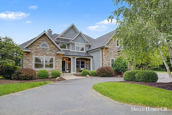 $1,395,000 | 5327 Canyon River Drive Northeast, Ada, MI 49301