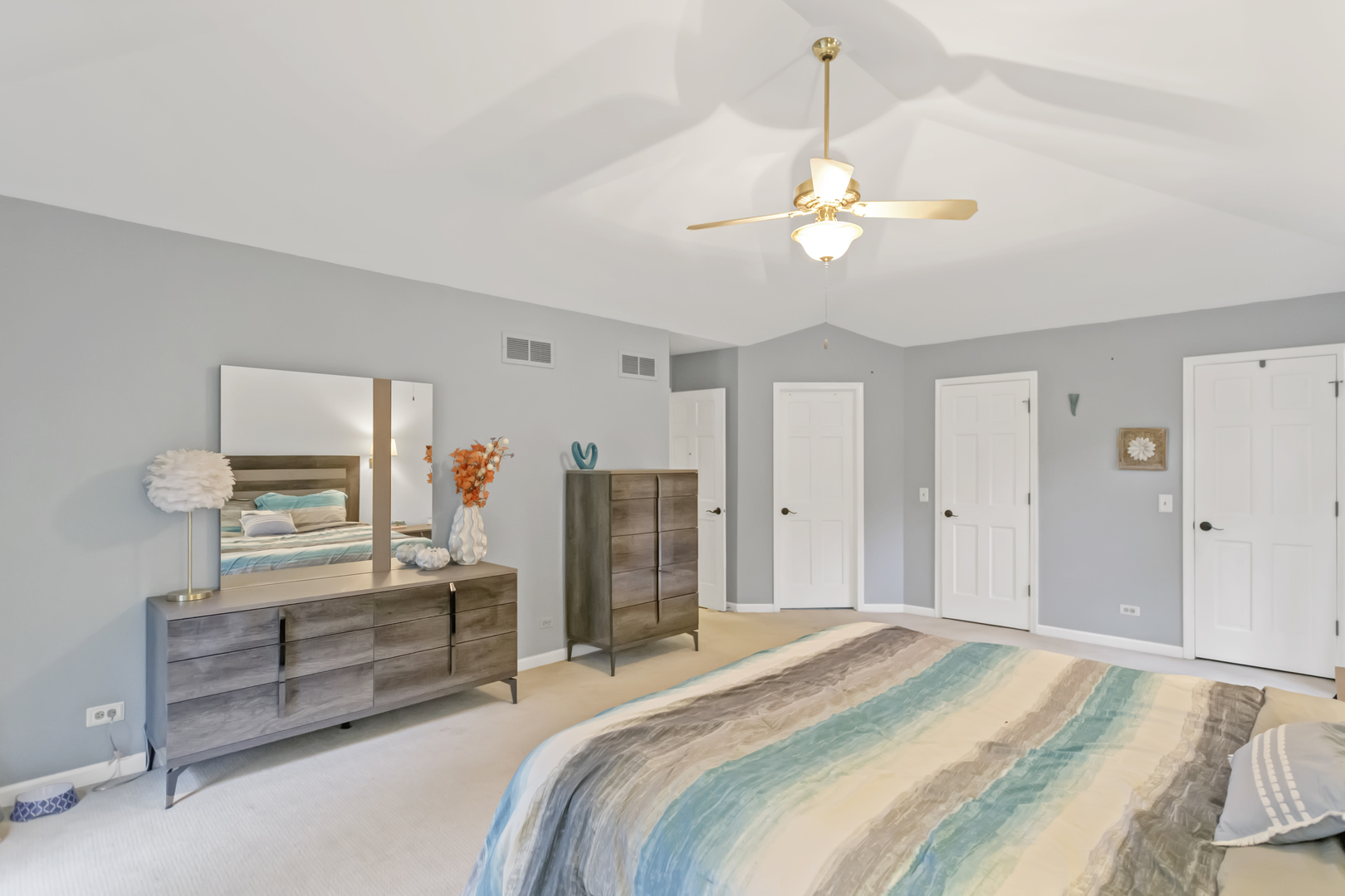 985 Chapel Court North Glen Ellyn, IL 60137 - Photo 23 of 46 a bedroom with a bed and a chandelier