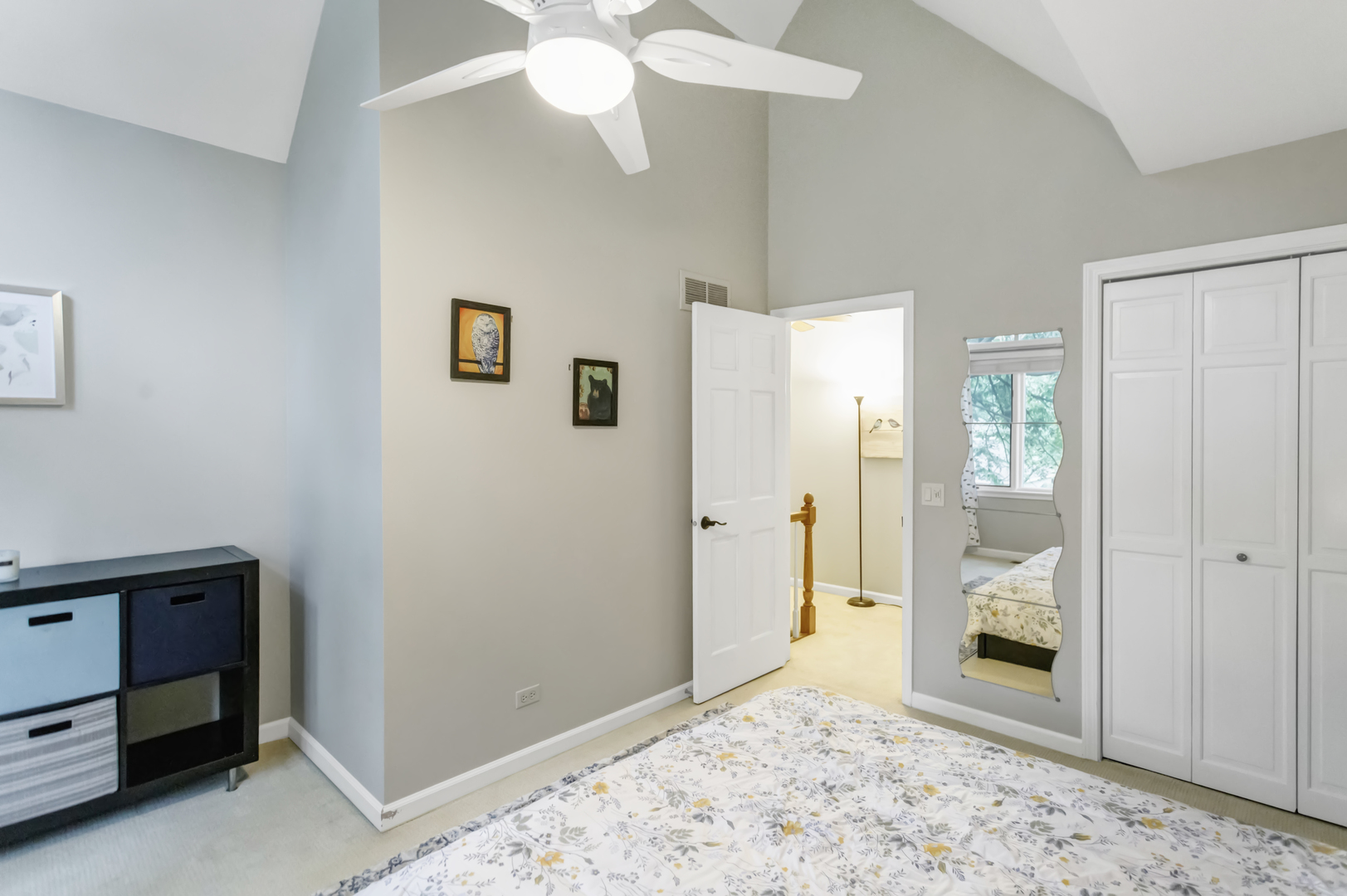985 Chapel Court North Glen Ellyn, IL 60137 - Photo 27 of 46 a view of a livingroom with wooden floor and a ceiling fan