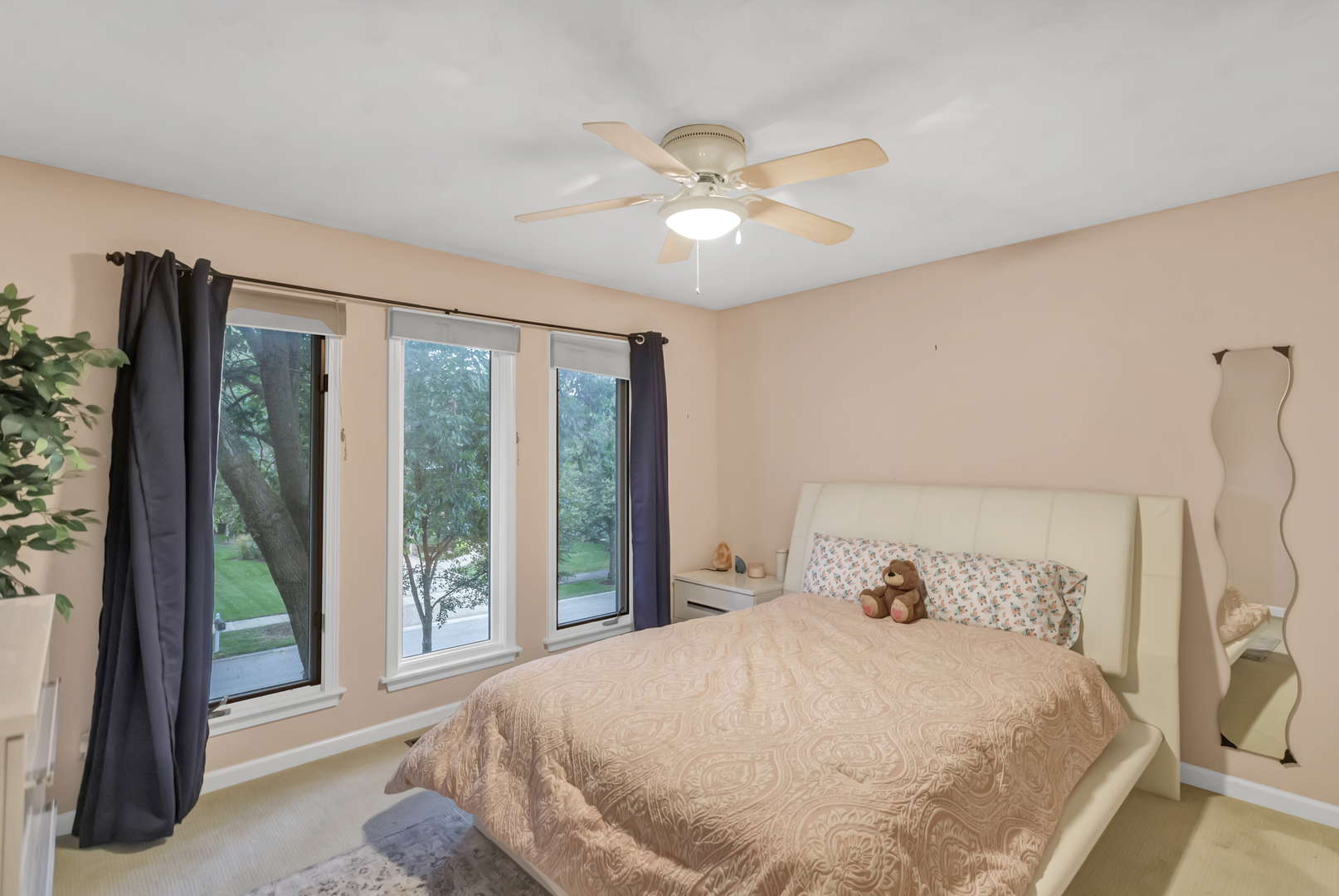 985 Chapel Court North Glen Ellyn, IL 60137 - Photo 28 of 46 a bedroom with a large bed and a large window