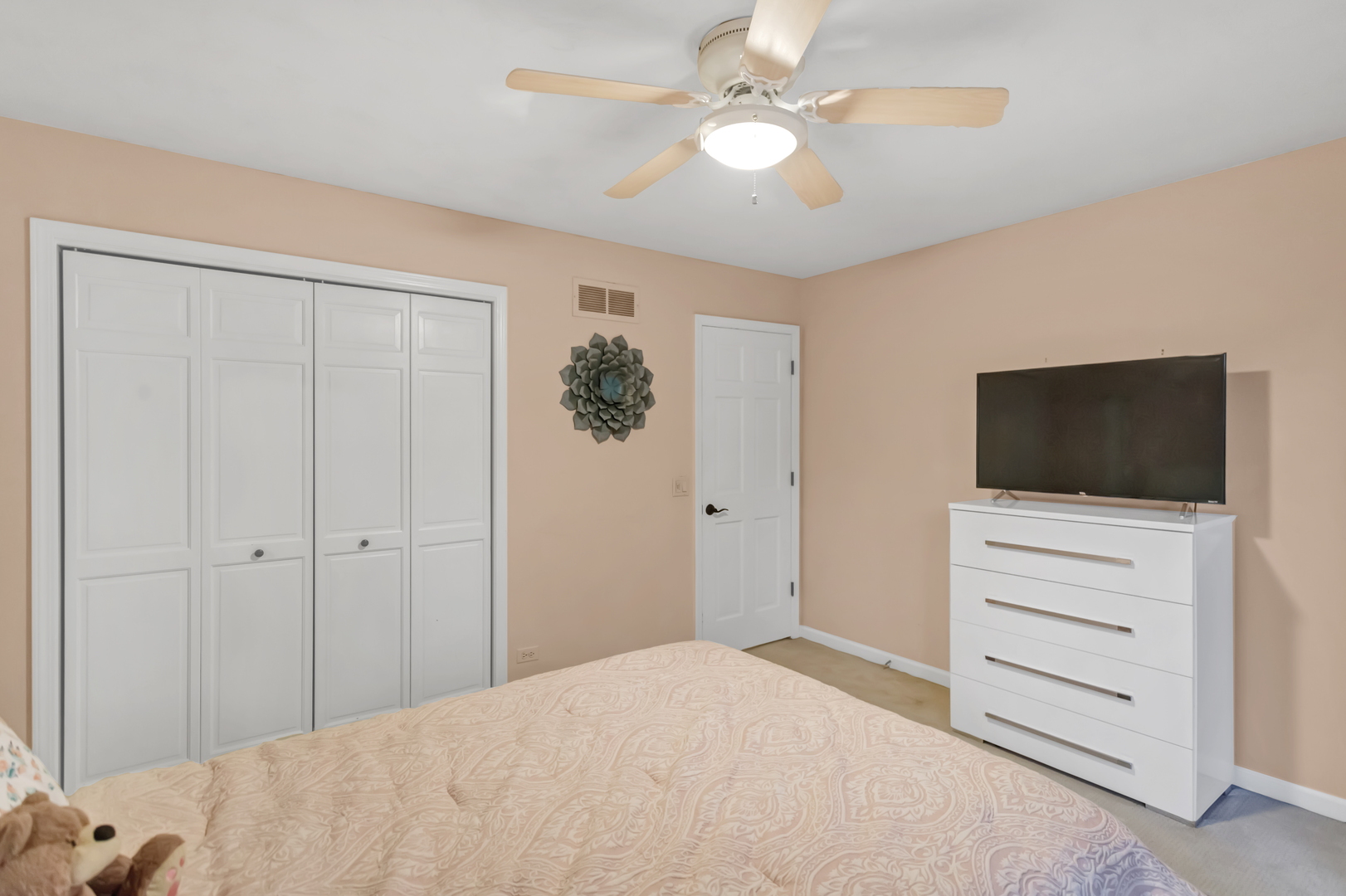 985 Chapel Court North Glen Ellyn, IL 60137 - Photo 29 of 46 a bedroom with a bed and a television