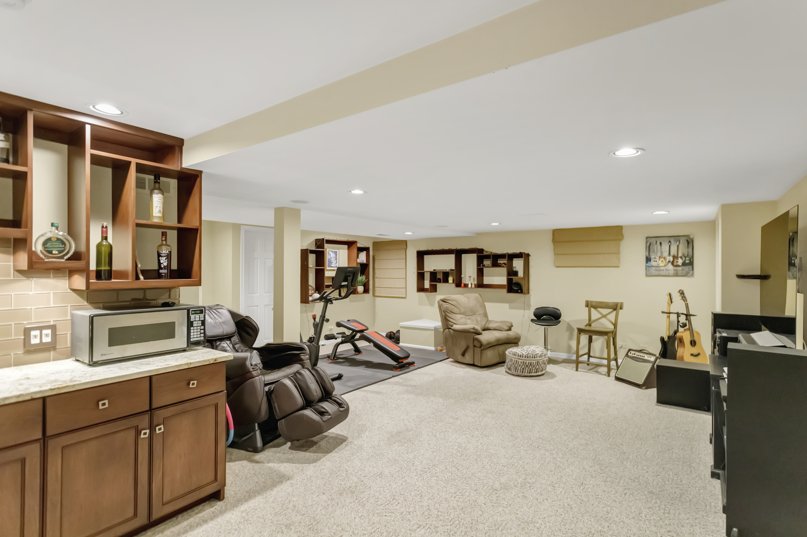 985 Chapel Court North Glen Ellyn, IL 60137 - Photo 35 of 46 a bed room with furniture and a flat screen tv
