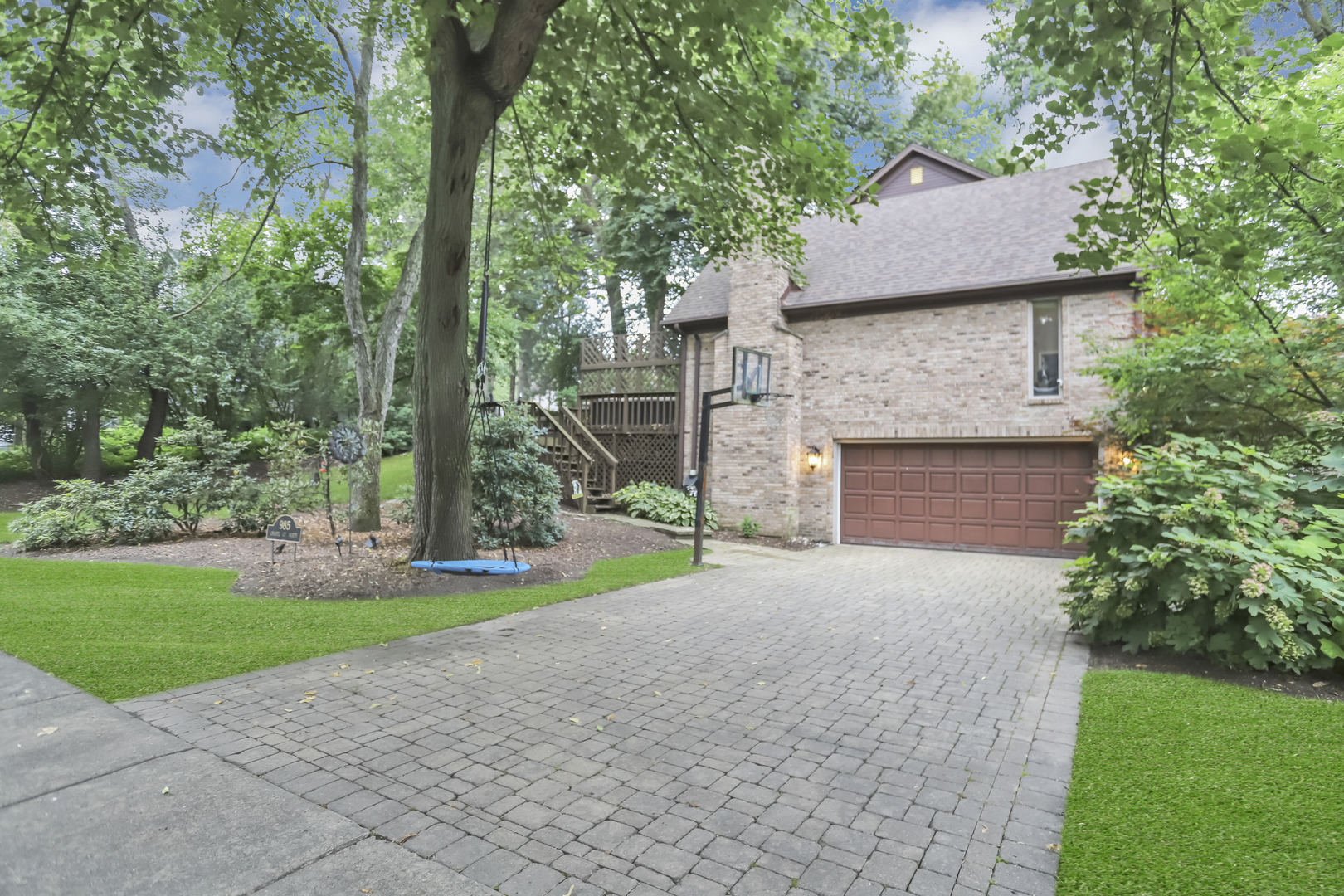 985 Chapel Court North Glen Ellyn, IL 60137 - Photo 46 of 46 a view of a house with a yard and a large tree