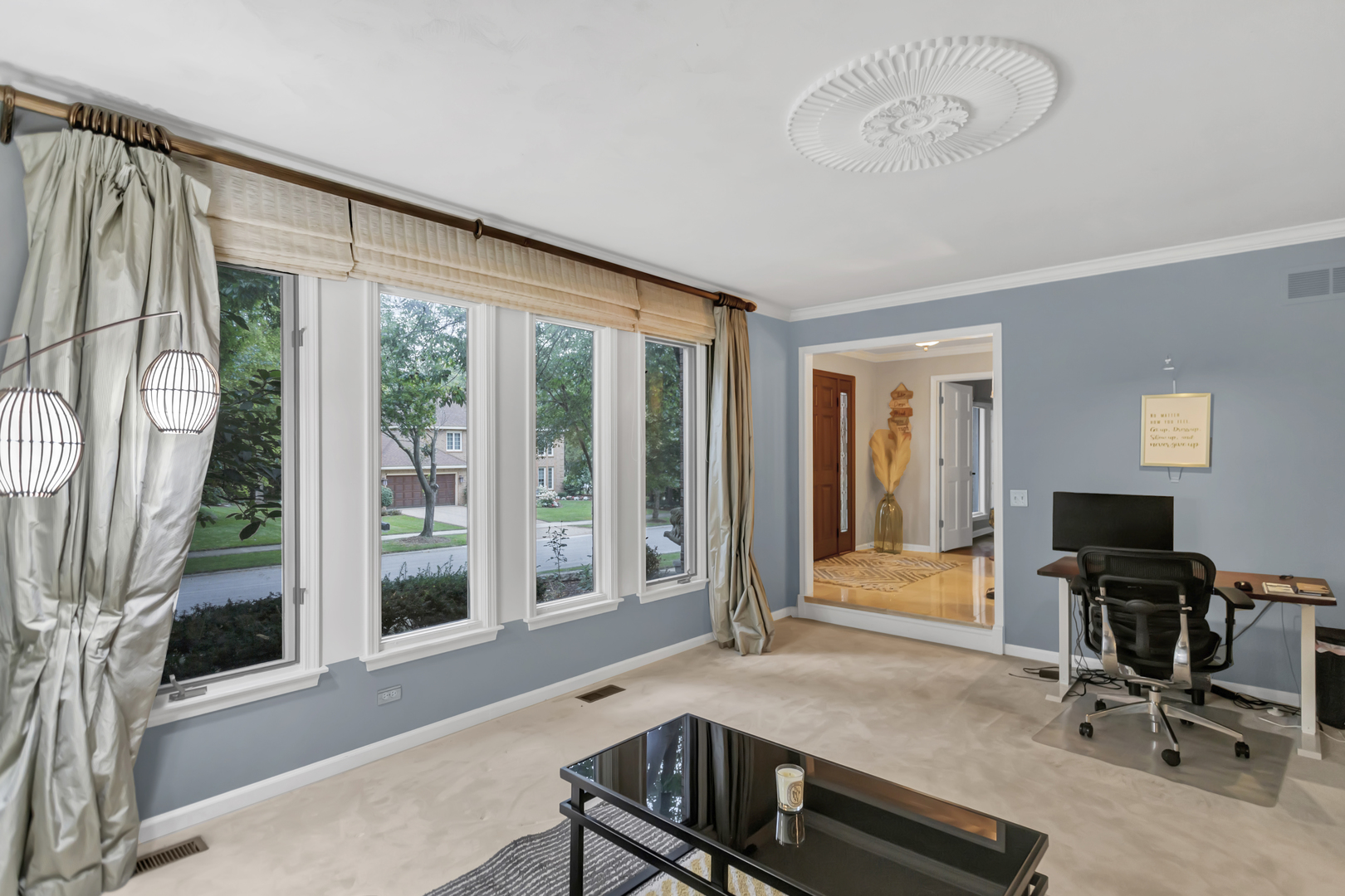 985 Chapel Court North Glen Ellyn, IL 60137 - Photo 6 of 46 a view of a livingroom with workspace and large windows