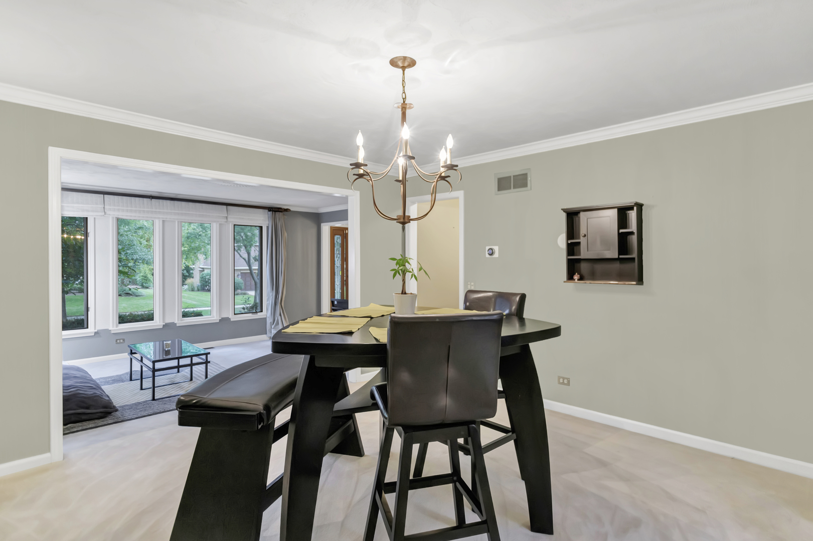 985 Chapel Court North Glen Ellyn, IL 60137 - Photo 7 of 46 a view of a dining room with furniture wooden floor and chandelier