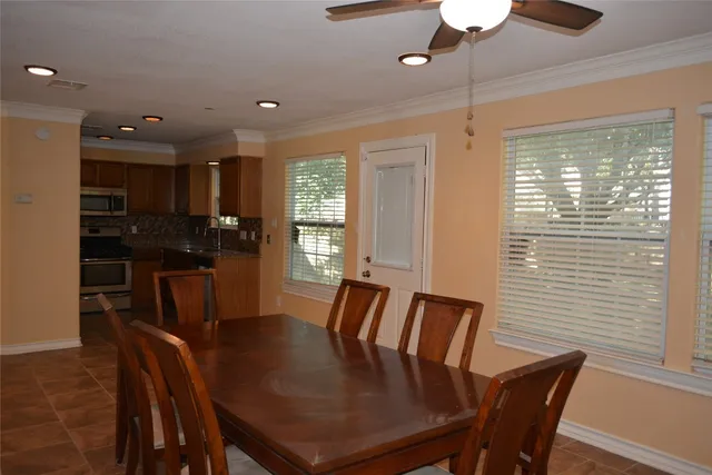 a view of a dining room with furniture