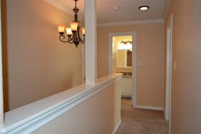 a view of a hallway with mirror