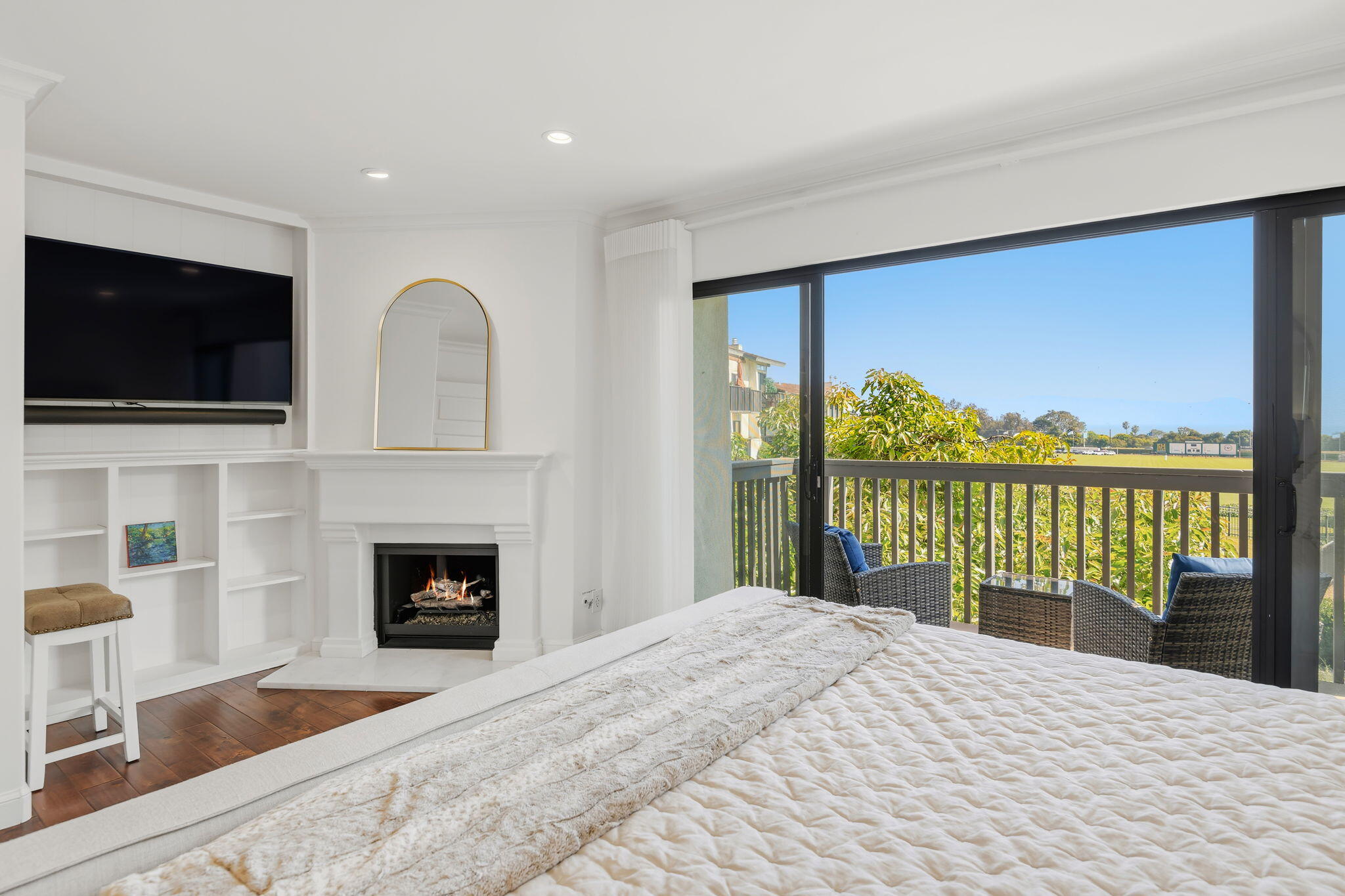 3375 Foothill Road, Unit 722 Carpinteria, CA 93013 - Photo 18 of 33 a bedroom with a bed and a flat screen tv