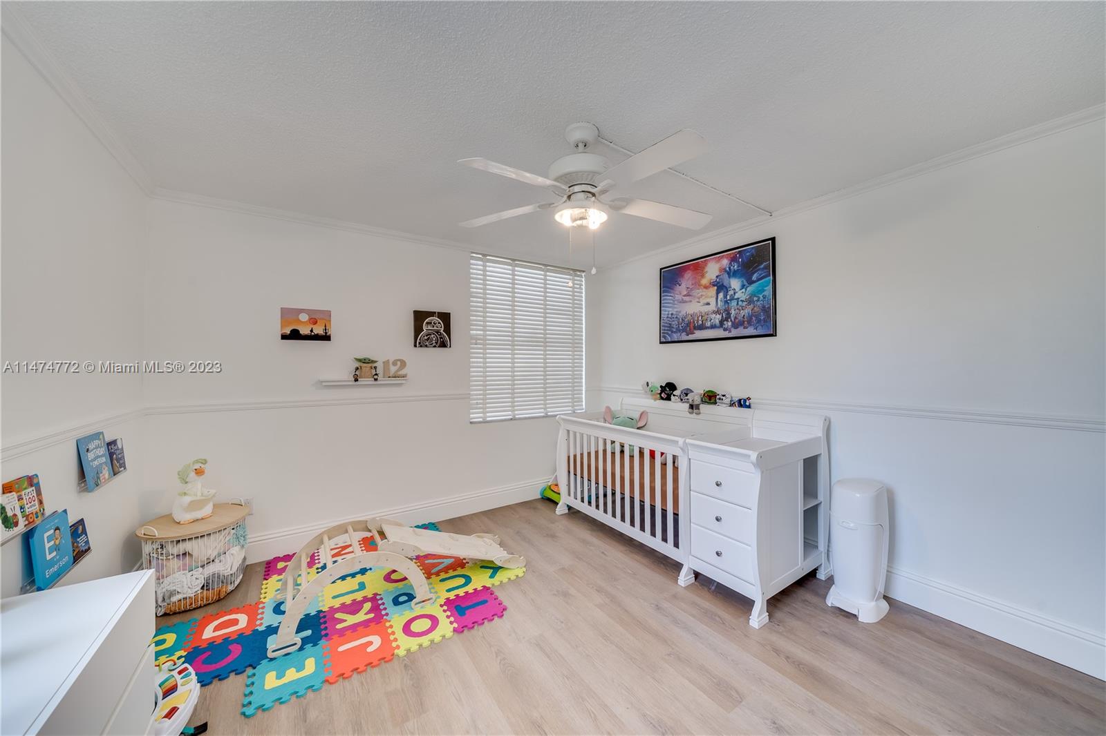 Promenade at Kendale Lakes Condominiums Miami, FL 33186 - Photo 17 of 29 a bedroom with furniture and a bed