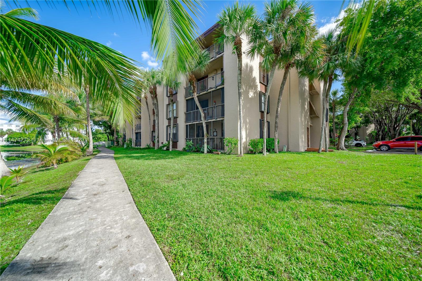 Promenade at Kendale Lakes Condominiums Miami, FL 33186 - Photo 27 of 29 a view of a yard with plants