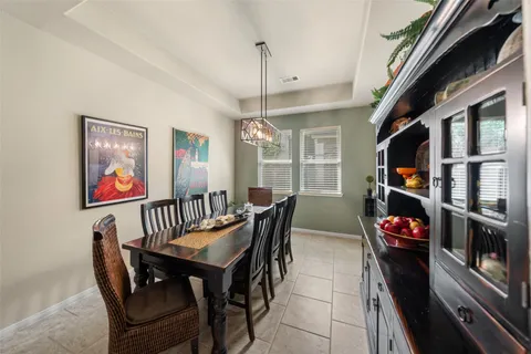 a kitchen with stainless steel appliances granite countertop a stove sink and cabinets