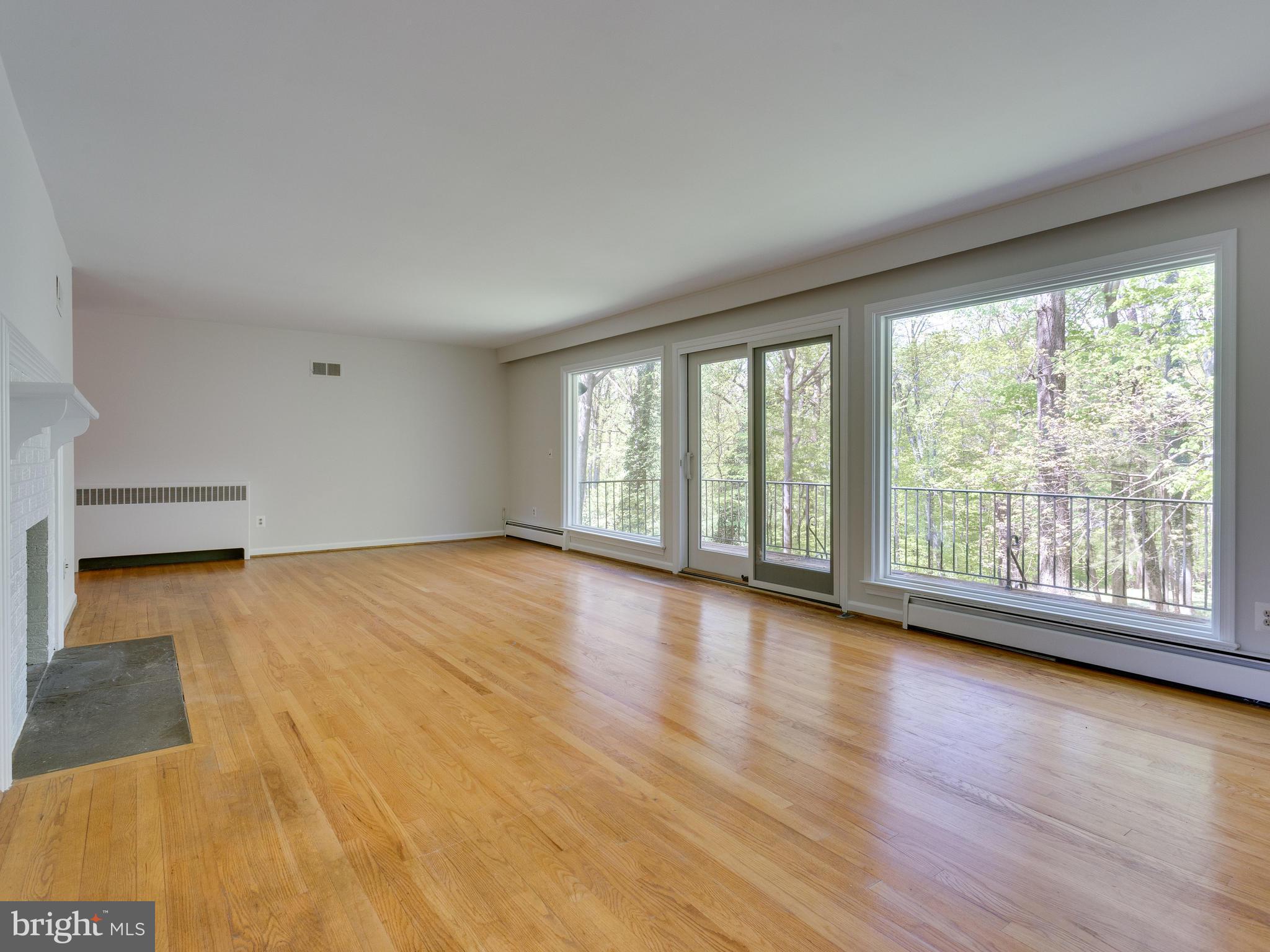 7828 Langley Ridge Road McLean, VA 22102 - Photo 11 of 28 Deck off Main Level Living Room