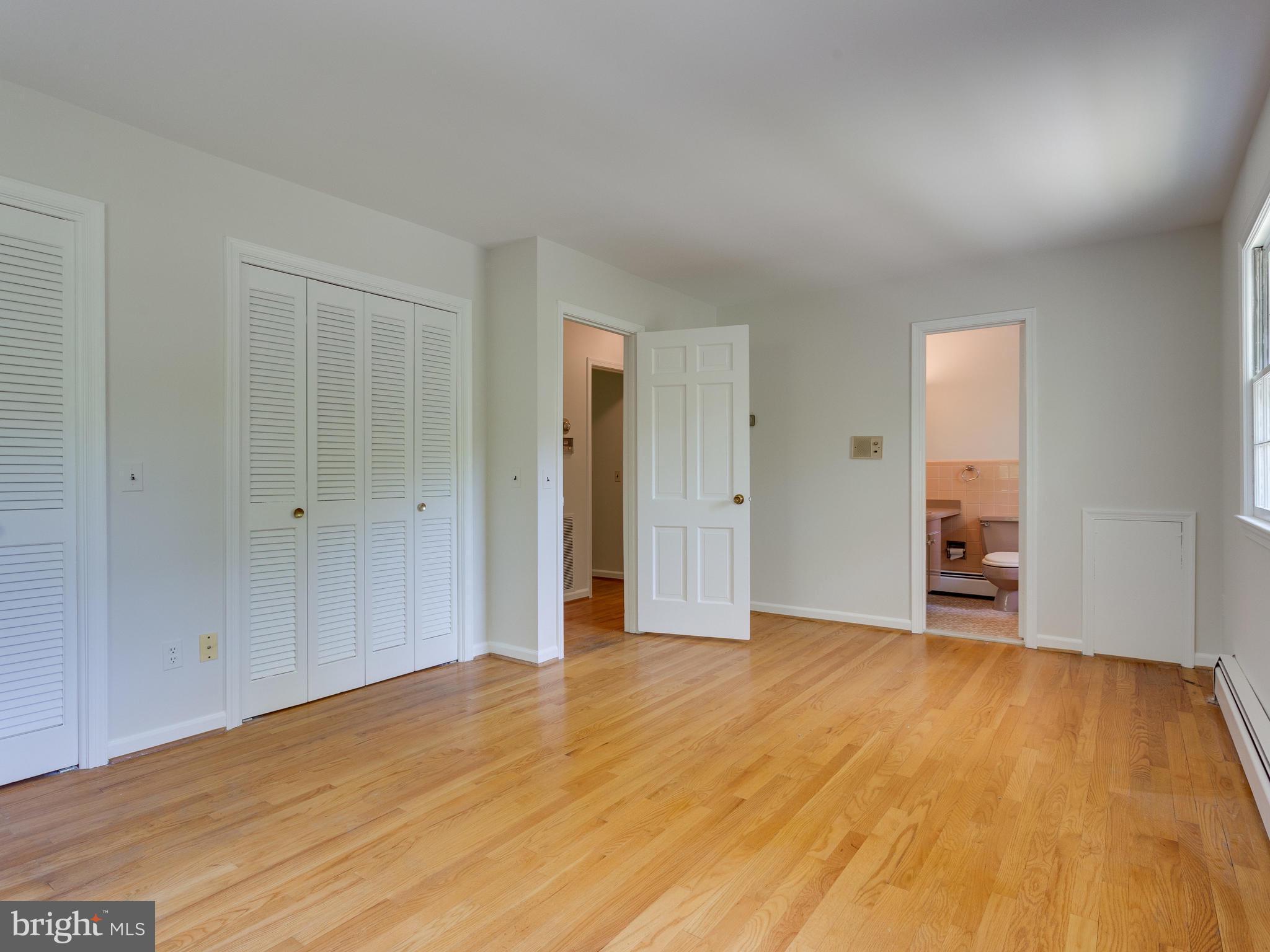 7828 Langley Ridge Road McLean, VA 22102 - Photo 19 of 28 Master Bedroom with Full Master Bath Main Level