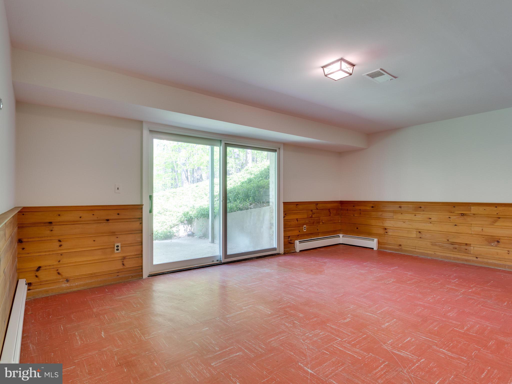 7828 Langley Ridge Road McLean, VA 22102 - Photo 25 of 28 Lower Level Family Room Walk Out to Backyard