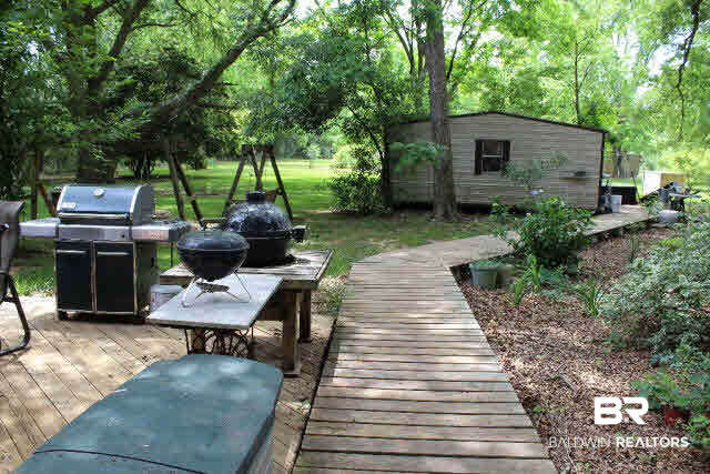 10375 Russ Road Daphne, AL 36526 - Photo 15 of 25 Convenient Raised Walkways from house to workshop/storage