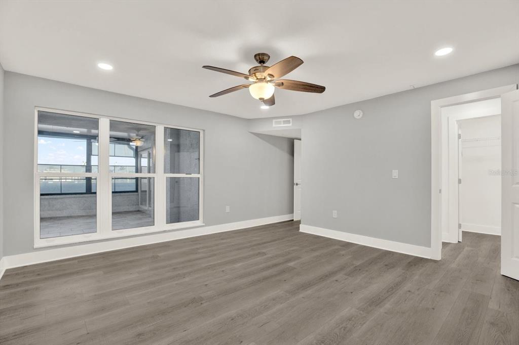 337 Rex Place, Unit A Madeira Beach, FL 33708 - Photo 18 of 48 a view of an empty room with a window