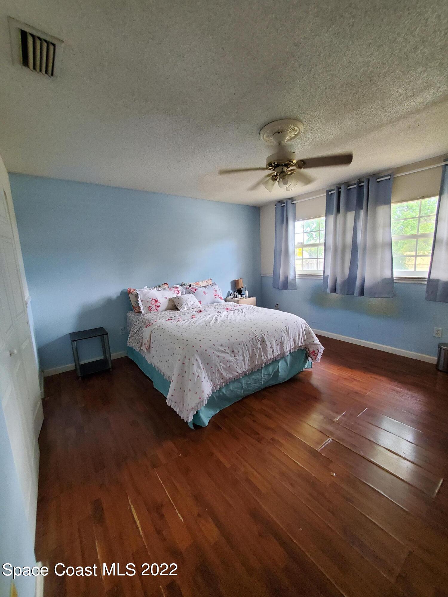 1195 Cotton Road Northeast Palm Bay, FL 32905 - Photo 13 of 35 Master bedroom