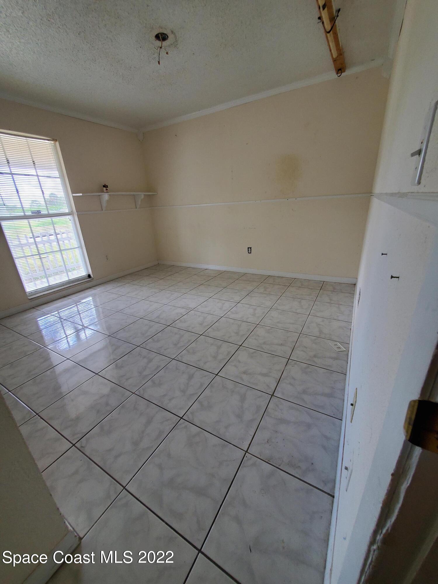 1195 Cotton Road Northeast Palm Bay, FL 32905 - Photo 18 of 35 3rd bedroom