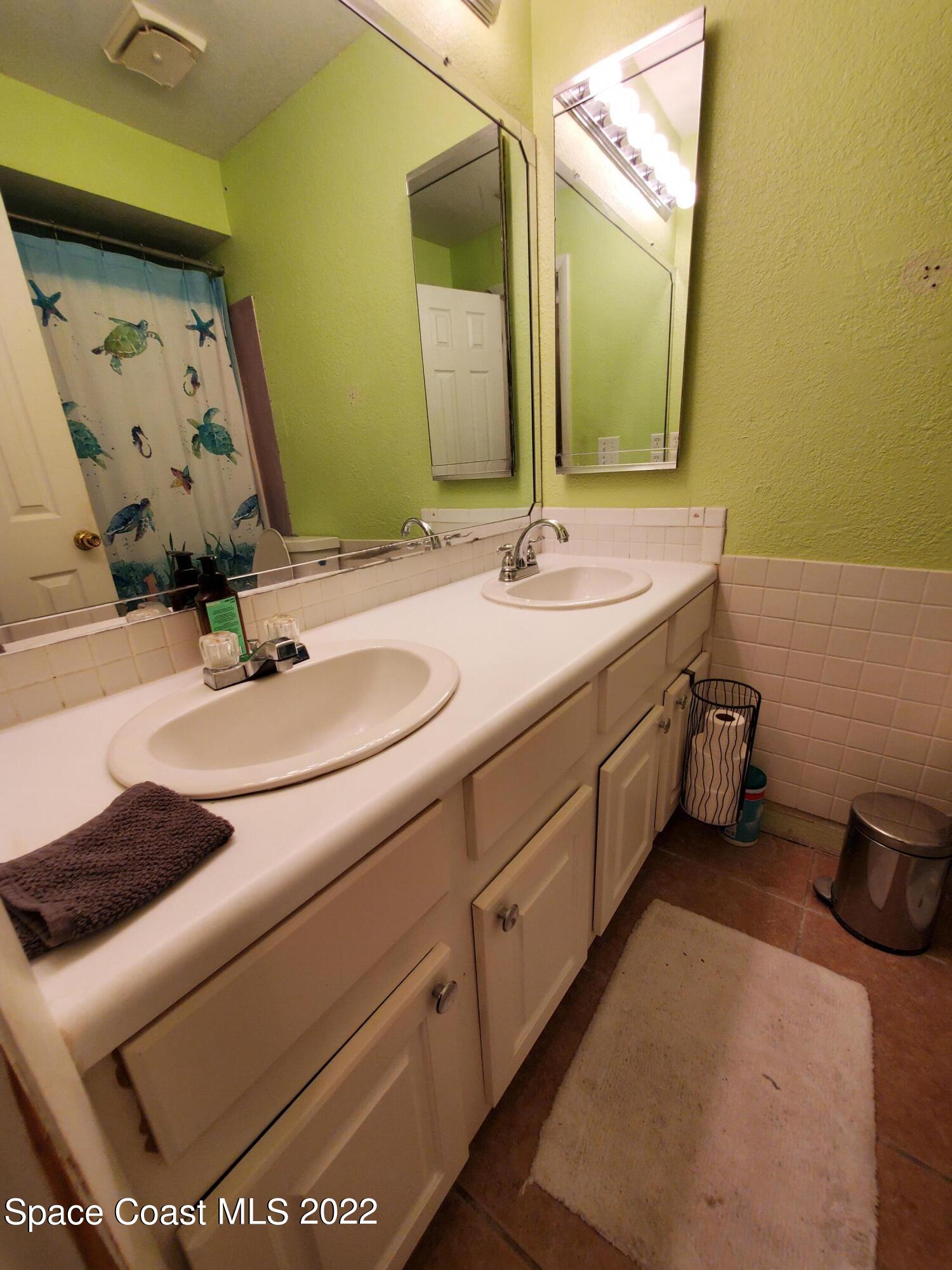 1195 Cotton Road Northeast Palm Bay, FL 32905 - Photo 19 of 35 guest bath