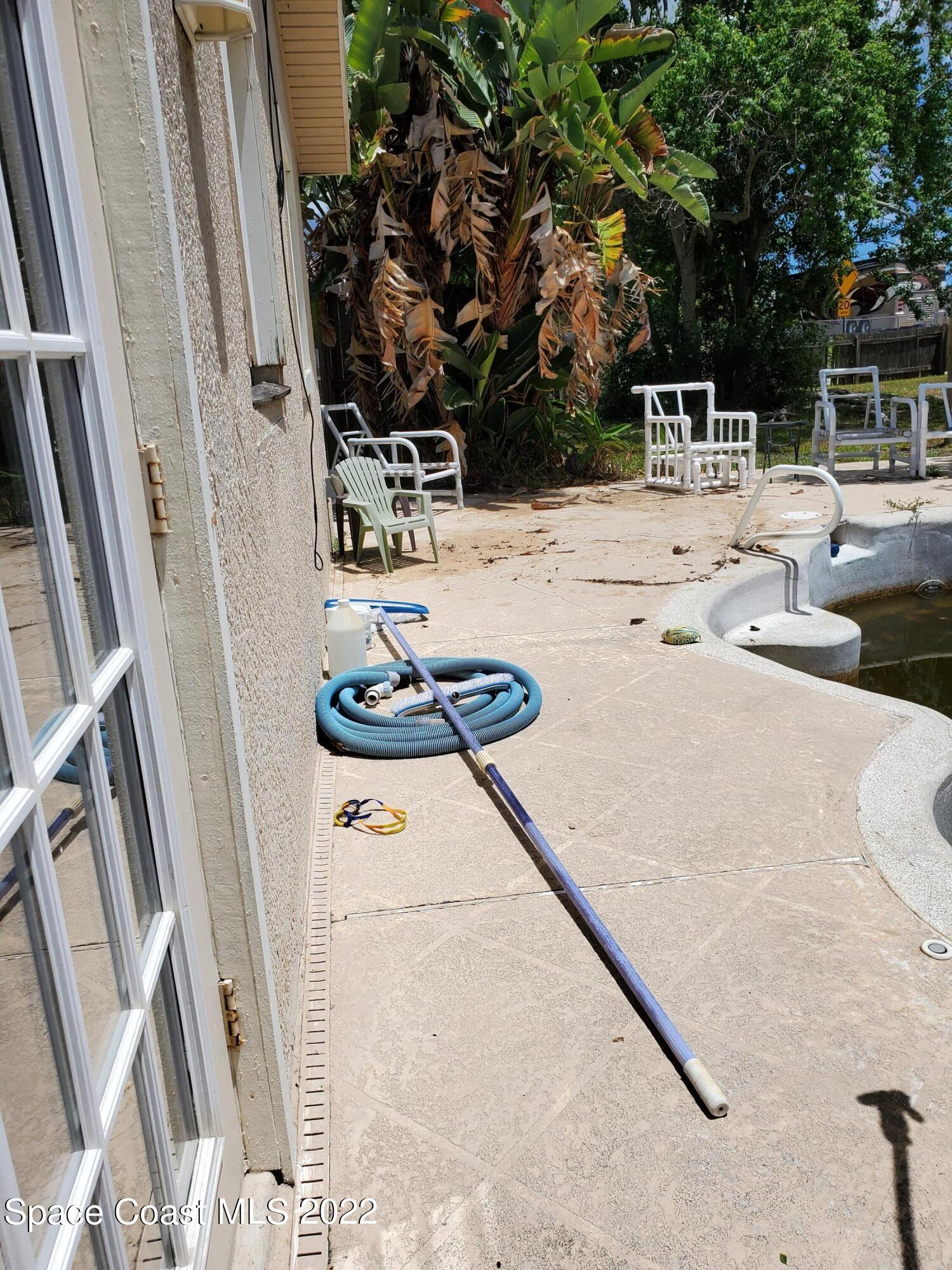 1195 Cotton Road Northeast Palm Bay, FL 32905 - Photo 22 of 35 pool deck