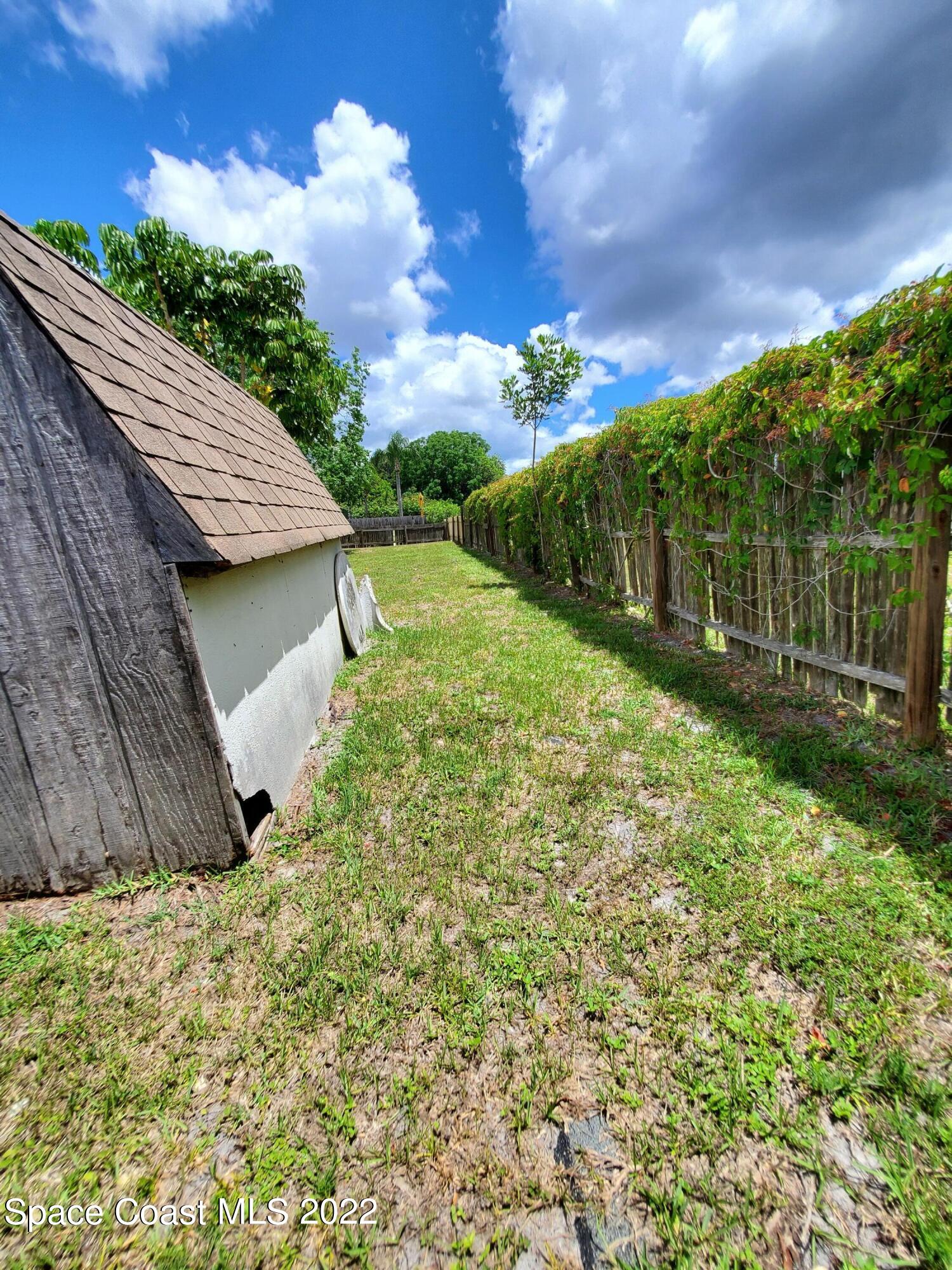 1195 Cotton Road Northeast Palm Bay, FL 32905 - Photo 24 of 35 right to left