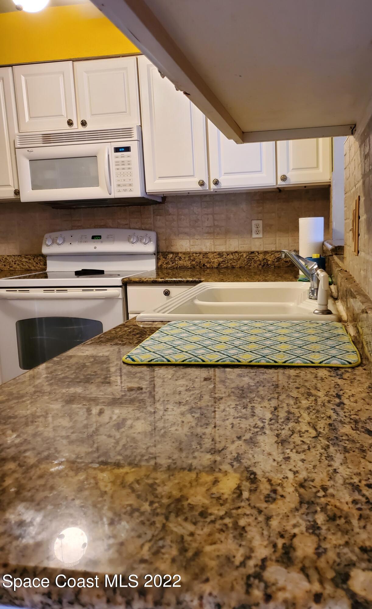 1195 Cotton Road Northeast Palm Bay, FL 32905 - Photo 32 of 35 kitchen2