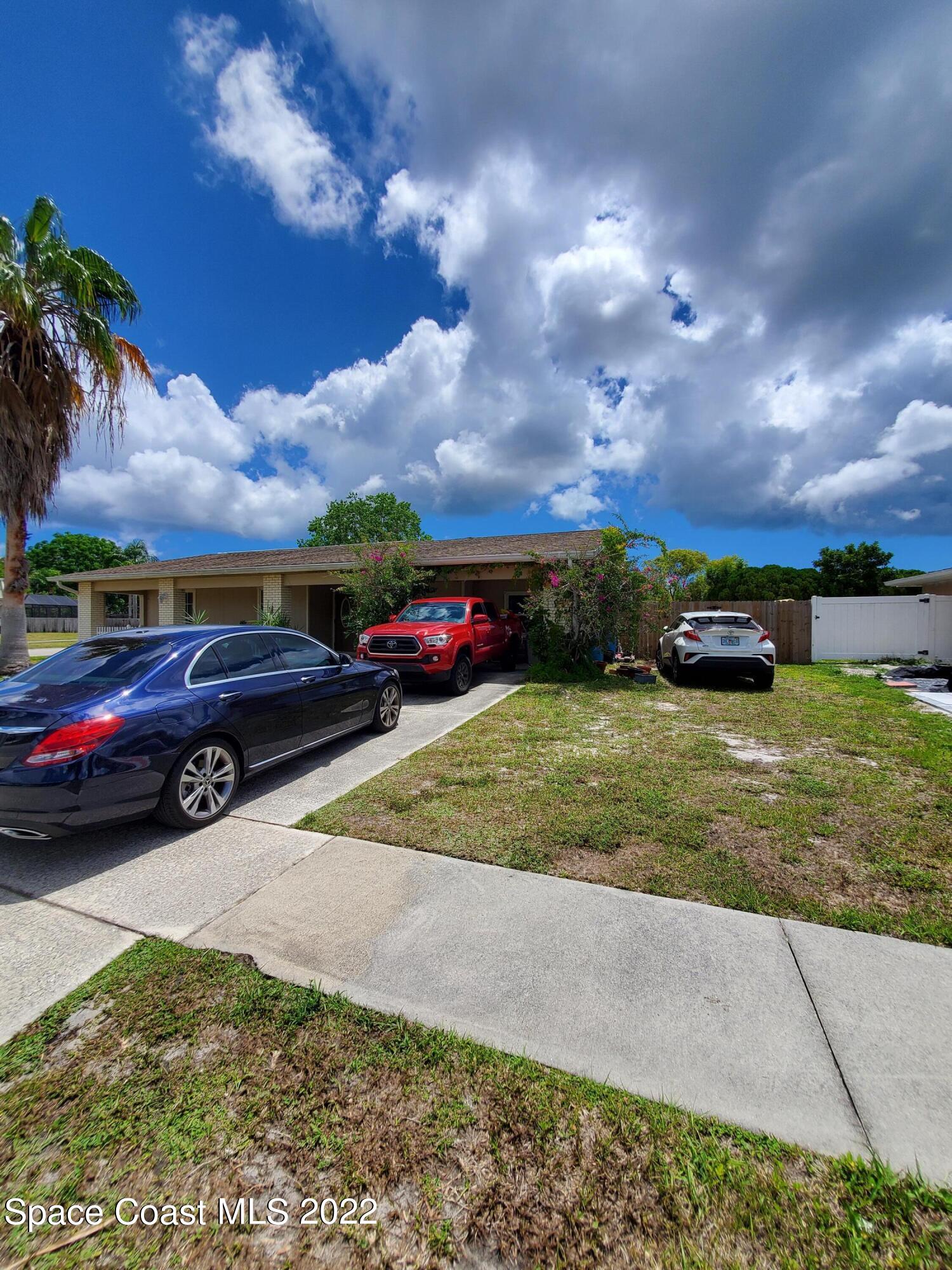 1195 Cotton Road Northeast Palm Bay, FL 32905 - Photo 6 of 35 carport
