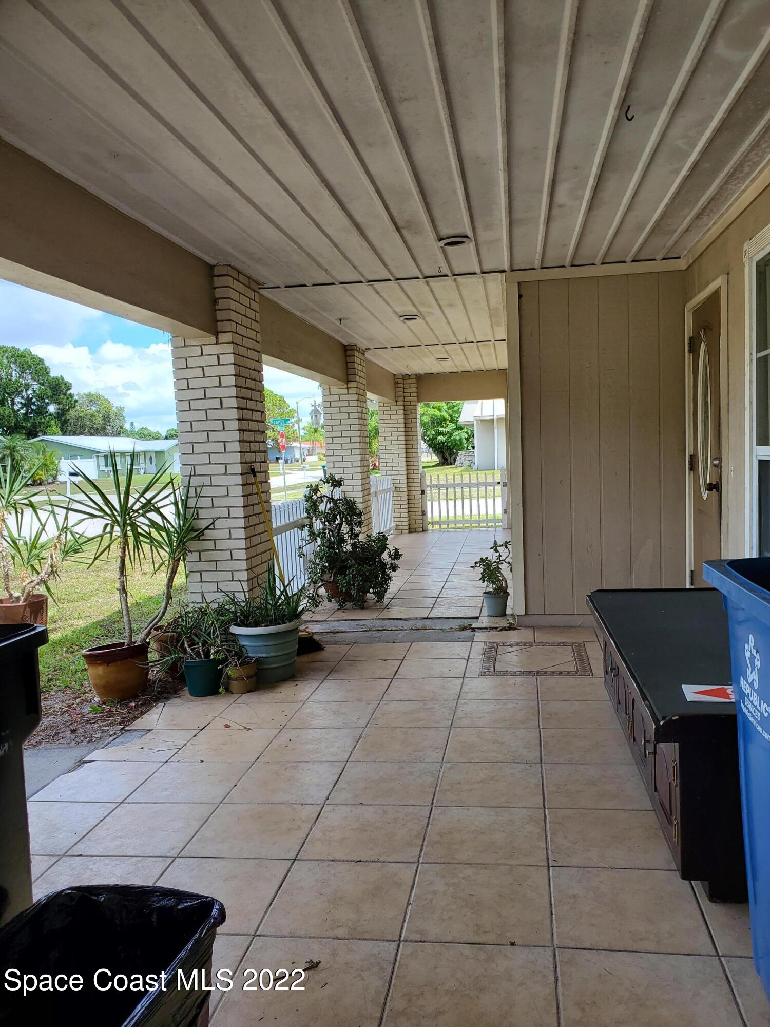 1195 Cotton Road Northeast Palm Bay, FL 32905 - Photo 7 of 35 front porch2