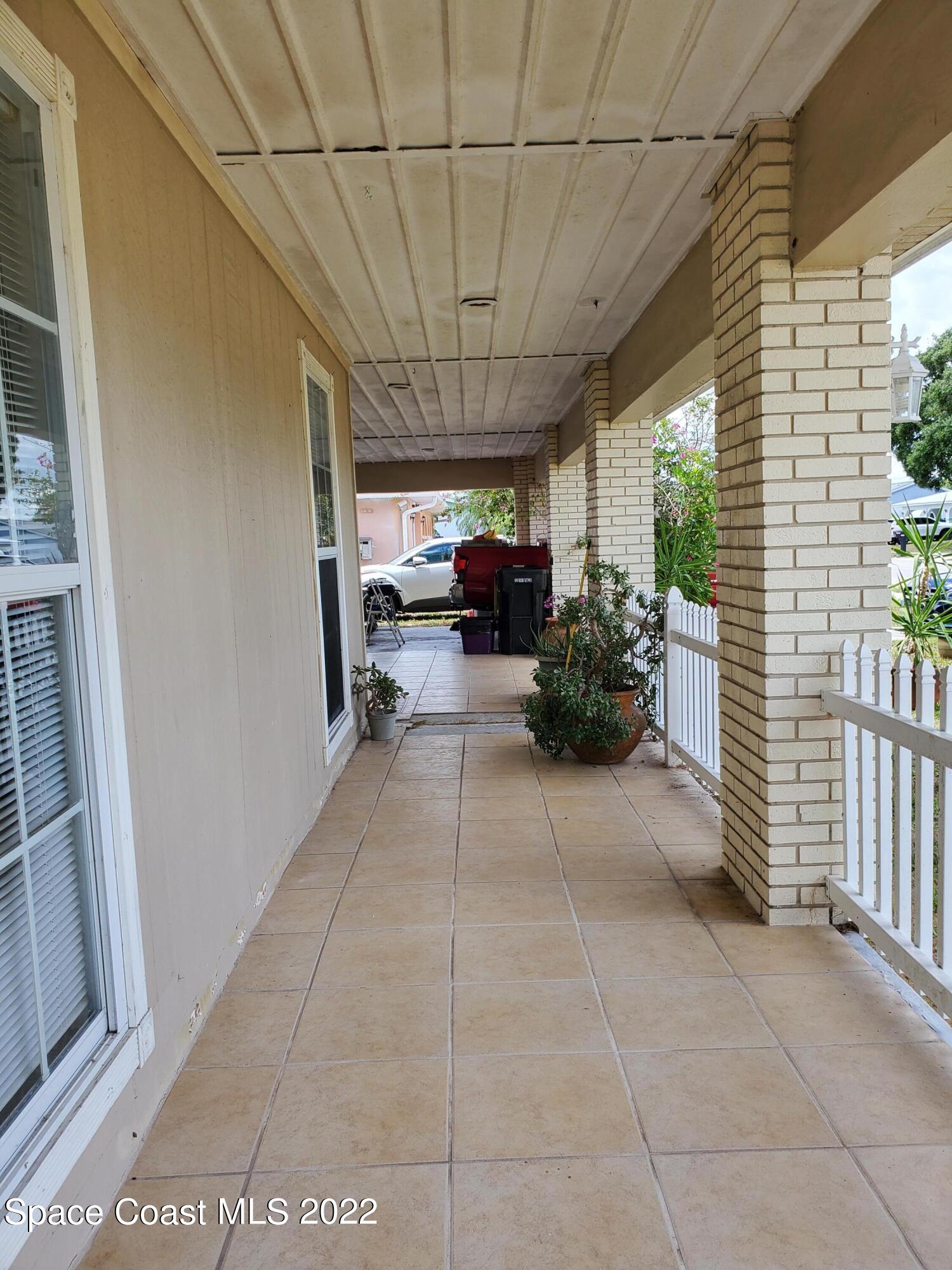 1195 Cotton Road Northeast Palm Bay, FL 32905 - Photo 8 of 35 front porch3