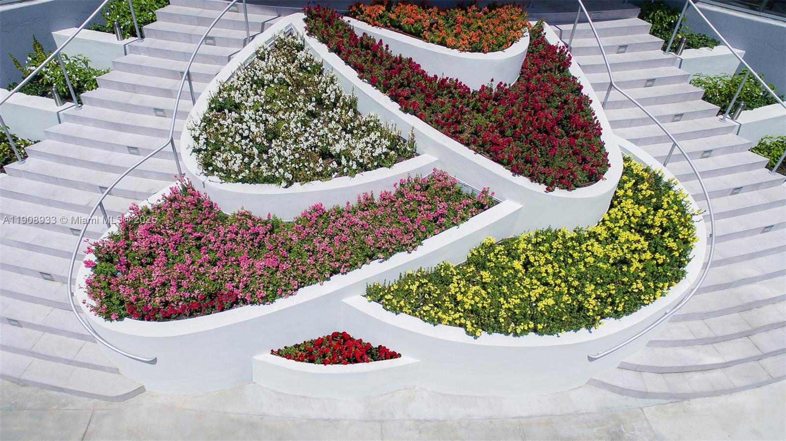 488 Northeast 18th Street, Unit 2701 Miami, FL 33132 - Photo 55 of 70 a view of a lot of flowers in a patio