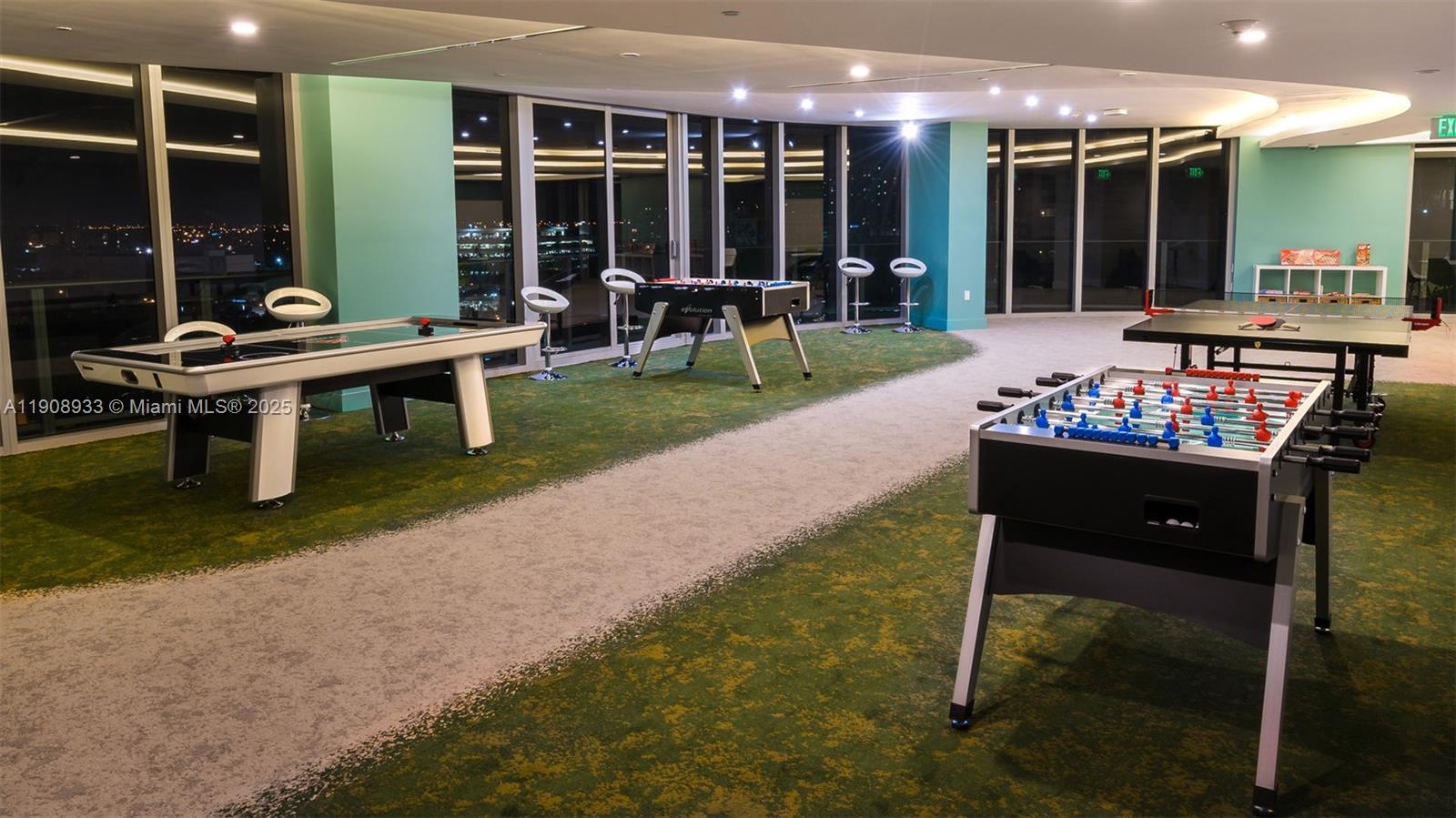 488 Northeast 18th Street, Unit 2701 Miami, FL 33132 - Photo 57 of 70 a building outdoor space with patio furniture and potted plants